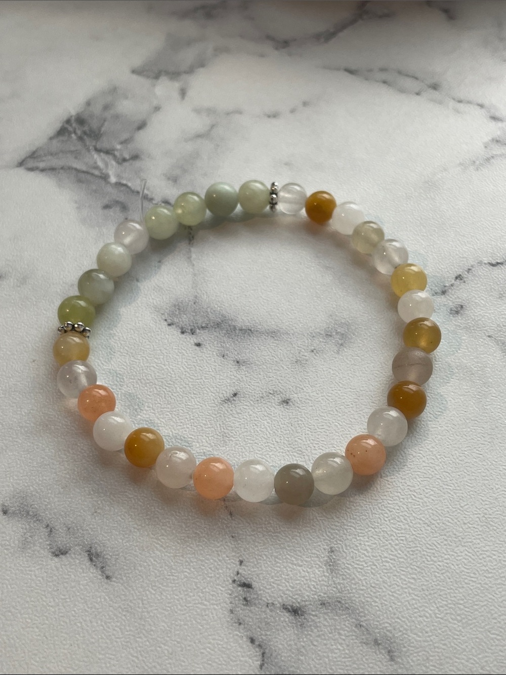 Natural stone, hand beaded elastic bracelet. 7.5 inches.